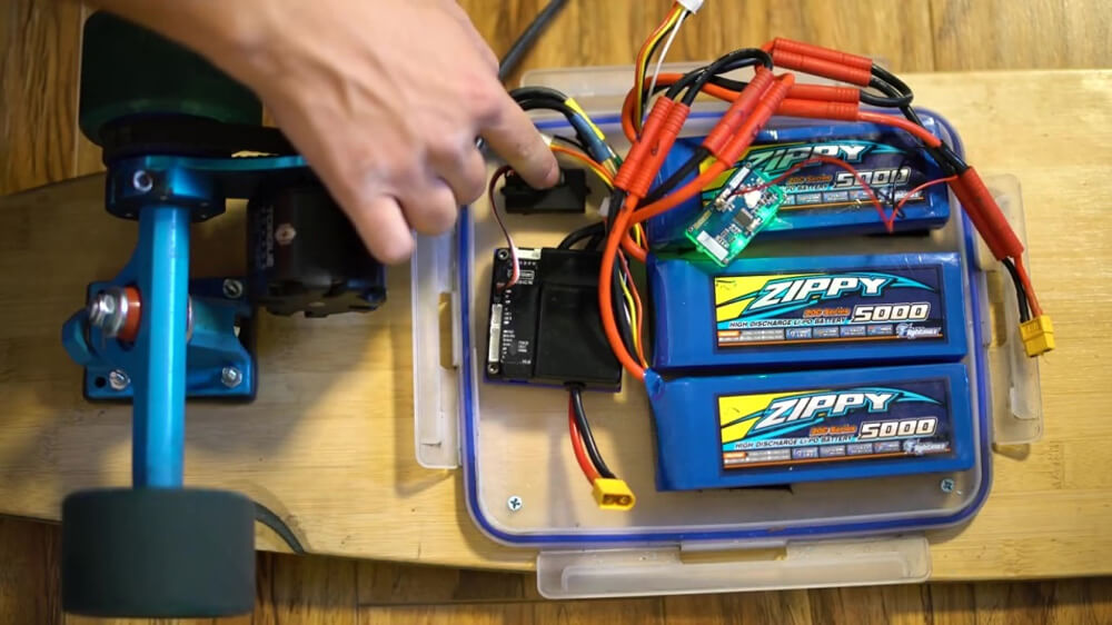 What is the range of the electric skateboard battery