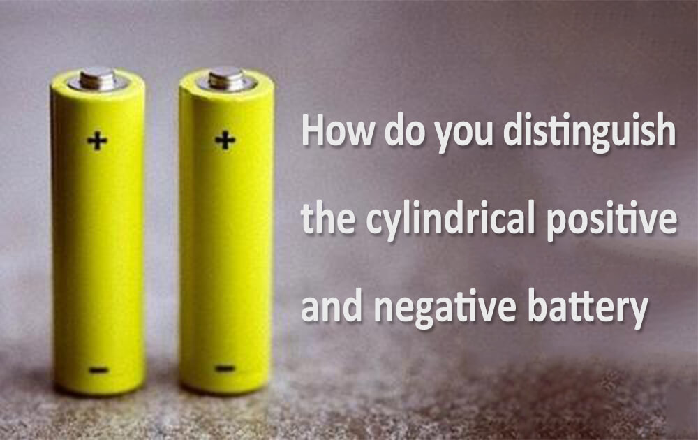 How do you distinguish the cylindrical positive and negative battery